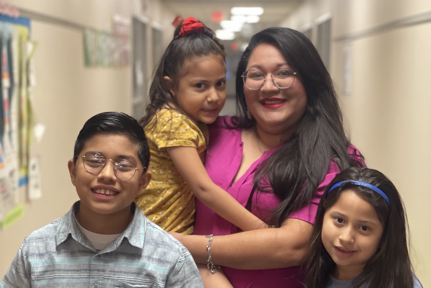 Ogden principal with three children