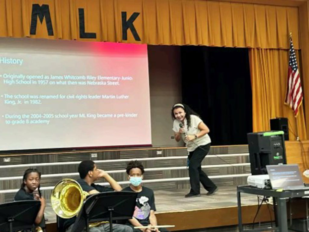 MLK Elementary principal on stage